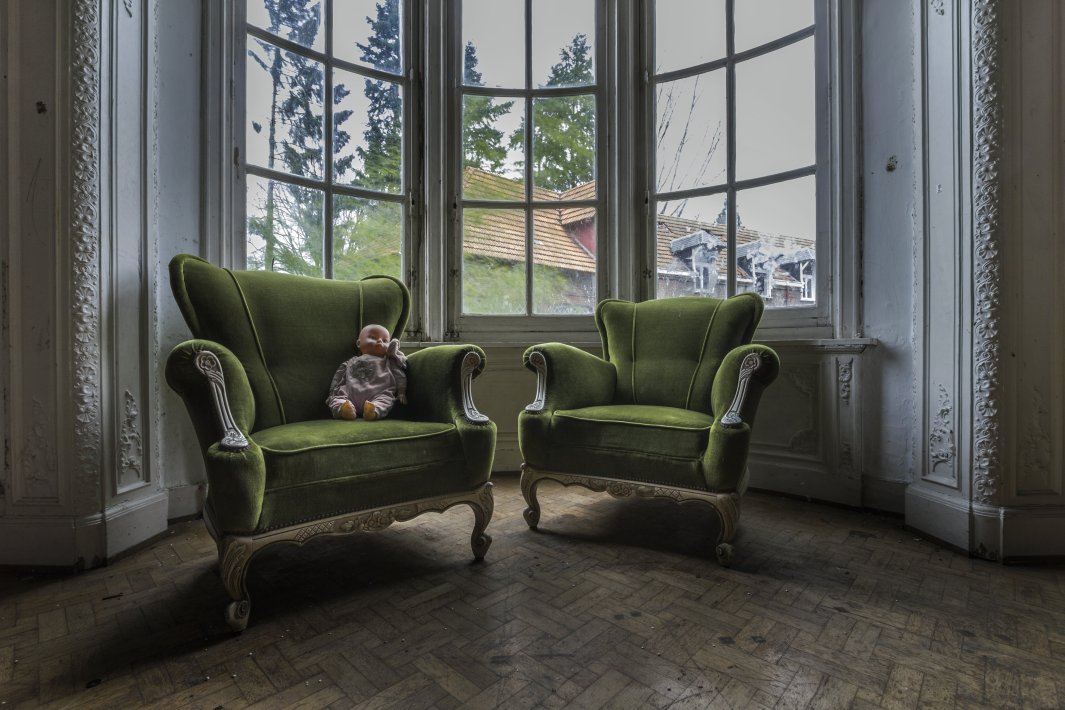old-green-chairs-with-an-doll-on-it.jpg