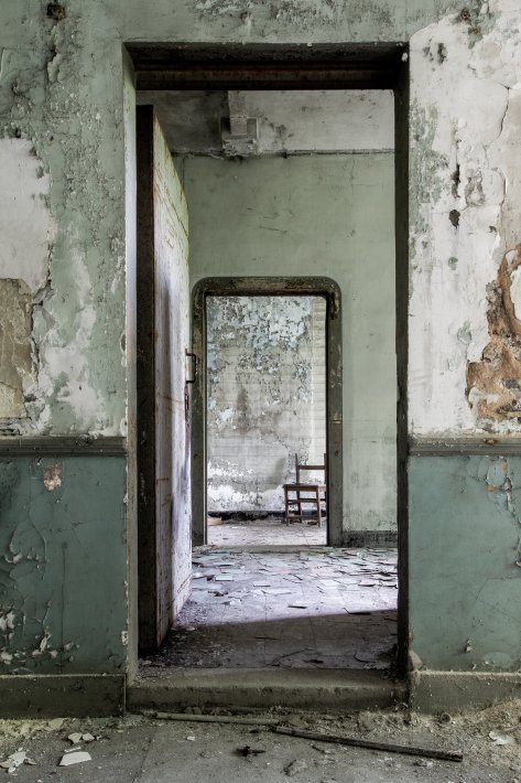 a-see-through-green-doors-in-an-abandoned-castle.jpg