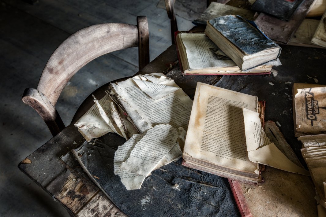 a-table-with-old-books-on-it.jpg