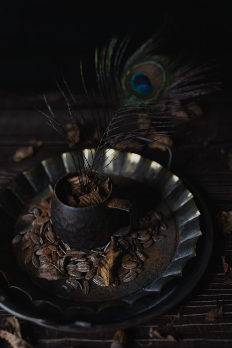 still-life-pewter-cup-with-a-peacock-feather.jpg