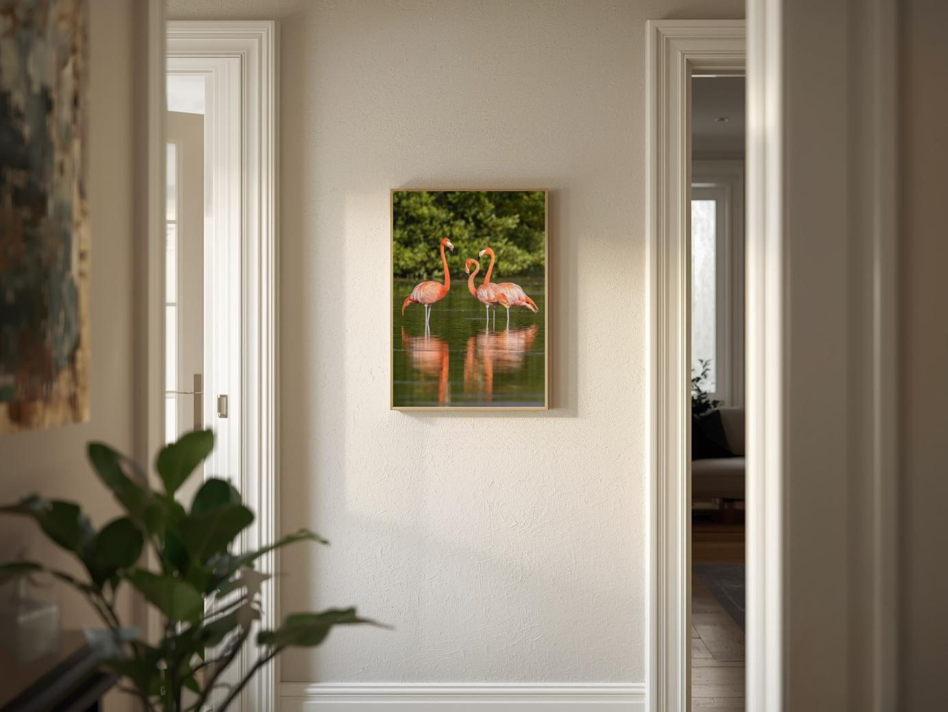 Schilderij met flamingo's aan de muur